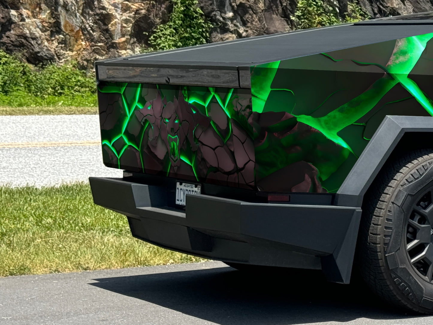 Glowing radioactive ooze cracks Cybertruck wrap